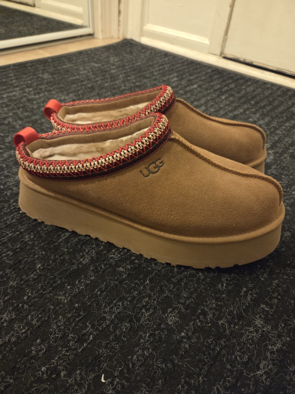 UGG Tazz Platform Suede Slip-On Mules in Chestnut with Red Trim